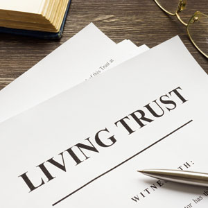 Living trust document with pen and glasse - THE LAW OFFICES OF DIANE ANDERSON